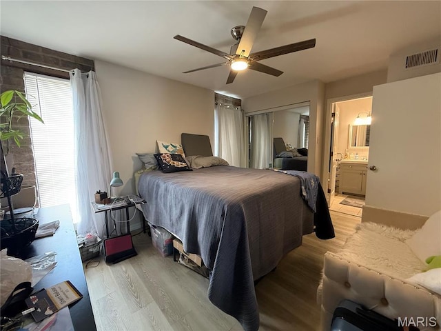 670 Coeur De Royale Dr Unit A, Creve Coeur, MO 63141 - bedroom with light wood finished floors, a ceiling fan, and a closet