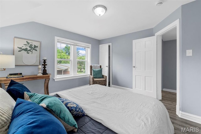 6629 Barken Ave, Northwoods, MO 63121 - bedroom with wood finished floors and baseboards