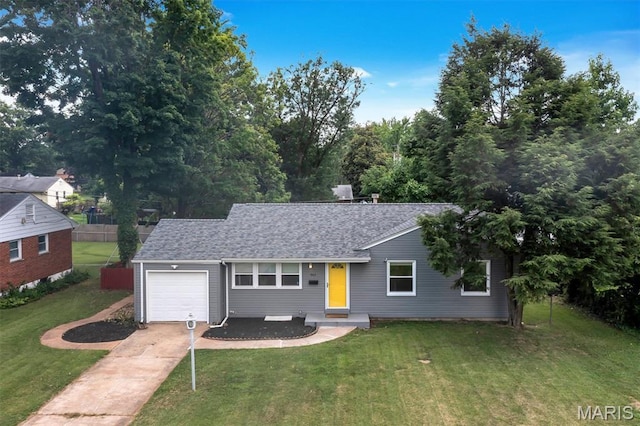 962 Buckeye Dr, Ferguson, MO 63135 - single story home with concrete driveway, an attached garage, a front yard, and a shingled roof