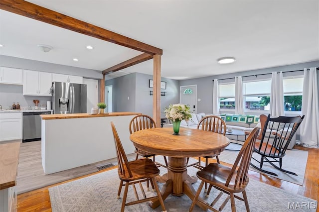 962 Buckeye Dr, Ferguson, MO 63135 - dining area featuring light wood-style floors and recessed lighting