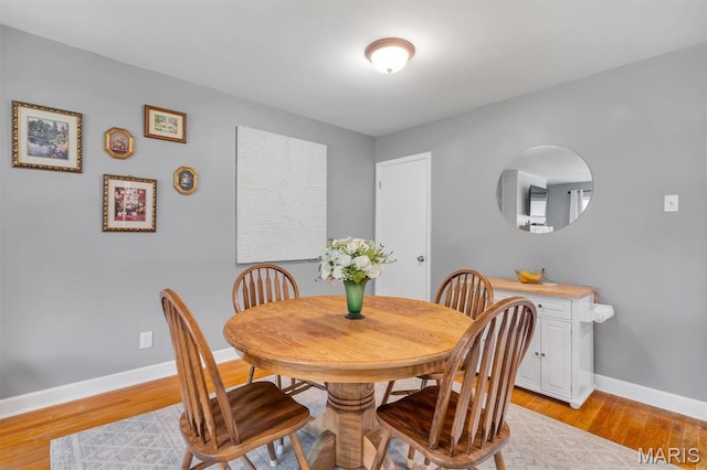 962 Buckeye Dr, Ferguson, MO 63135 - dining room with light wood-style floors