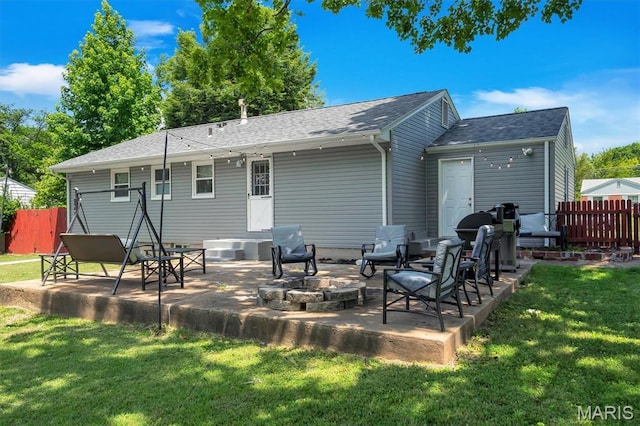 962 Buckeye Dr, Ferguson, MO 63135 - rear view of property with a patio area and roof with shingles