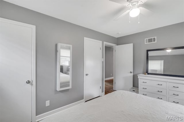 962 Buckeye Dr, Ferguson, MO 63135 - bedroom featuring ceiling fan and baseboards