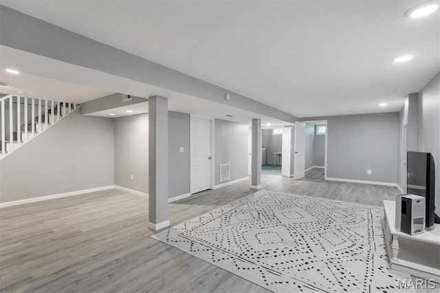 962 Buckeye Dr, Ferguson, MO 63135 - finished below grade area with wood finished floors and stairs