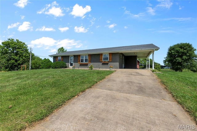 1658 County Road 435, Jackson, MO 63755 - single story home with concrete driveway, an attached carport, a front yard, and brick siding
