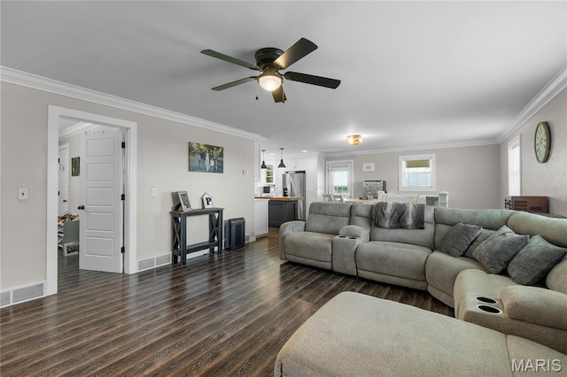 1658 County Road 435, Jackson, MO 63755 - living area featuring crown molding, dark wood-type flooring, and ceiling fan