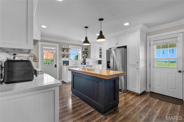 1658 County Road 435, Jackson, MO 63755 - kitchen with stainless steel fridge with ice dispenser, wooden counters, white cabinets, open shelves, and dark wood-type flooring