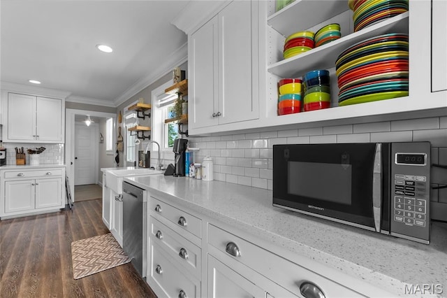 1658 County Road 435, Jackson, MO 63755 - kitchen with open shelves, crown molding, stainless steel dishwasher, white cabinets, and backsplash
