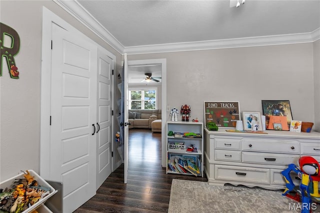 1658 County Road 435, Jackson, MO 63755 - game room with ornamental molding, dark wood-style floors, and a ceiling fan
