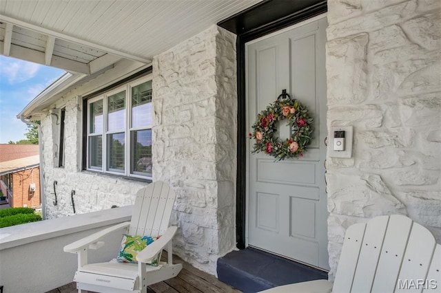 354 Frieda Ave, Kirkwood, MO 63122 - property entrance featuring stone siding and a porch