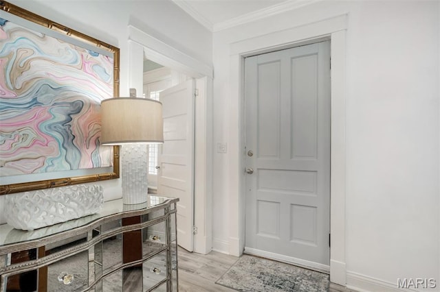 354 Frieda Ave, Kirkwood, MO 63122 - entryway featuring ornamental molding and wood finished floors