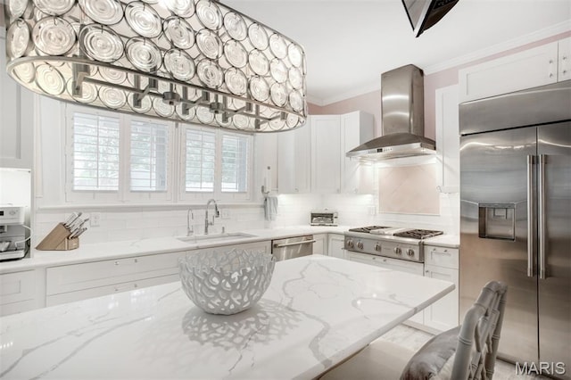 354 Frieda Ave, Kirkwood, MO 63122 - kitchen with stainless steel appliances, wall chimney exhaust hood, decorative backsplash, ornamental molding, and white cabinets