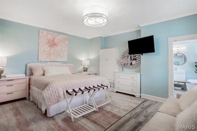 354 Frieda Ave, Kirkwood, MO 63122 - bedroom with light wood-style floors and crown molding