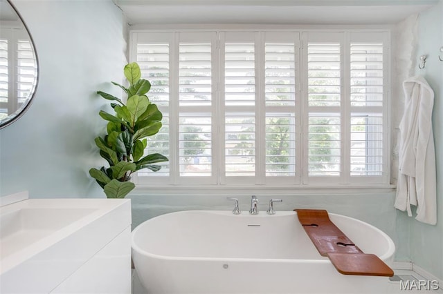 354 Frieda Ave, Kirkwood, MO 63122 - full bath featuring a freestanding tub and vanity