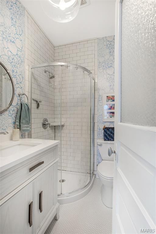 354 Frieda Ave, Kirkwood, MO 63122 - bathroom featuring vanity, a stall shower, and tile patterned flooring