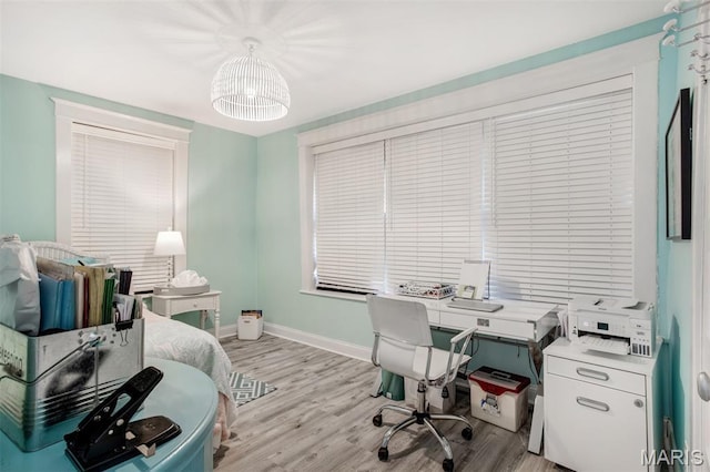 354 Frieda Ave, Kirkwood, MO 63122 - home office featuring light wood-style flooring and a chandelier