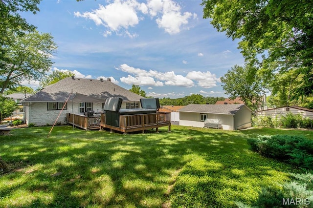354 Frieda Ave, Kirkwood, MO 63122 - back of house with a deck, a lawn, and stone siding