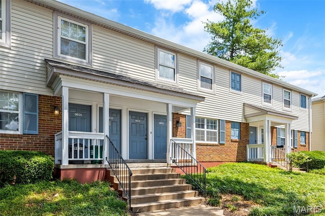 9029 N Swan Cir, Saint Louis, MO 63144 - view of front of property featuring brick siding