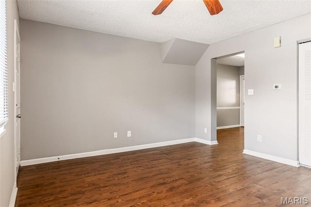 9029 N Swan Cir, Saint Louis, MO 63144 - unfurnished room featuring a ceiling fan, dark wood-type flooring, and a textured ceiling
