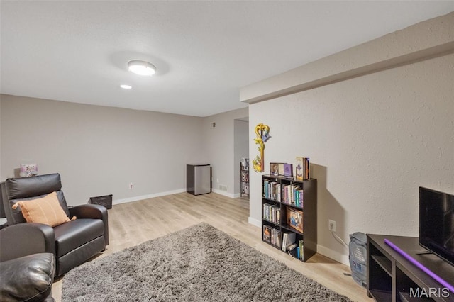 164 Burtonwood Dr, Ballwin, MO 63011 - living room with wood finished floors and baseboards