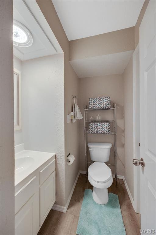 164 Burtonwood Dr, Ballwin, MO 63011 - bathroom with vanity and wood finished floors