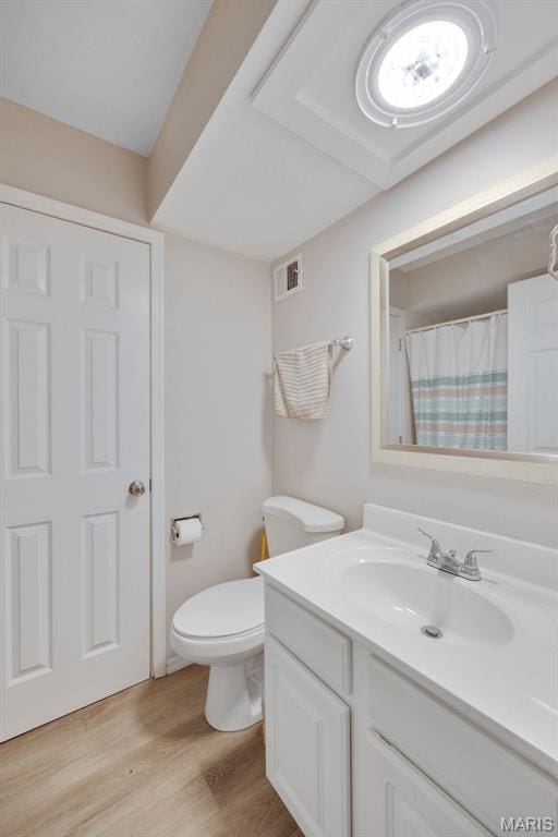 164 Burtonwood Dr, Ballwin, MO 63011 - full bathroom with vanity, wood finished floors, and a shower with curtain