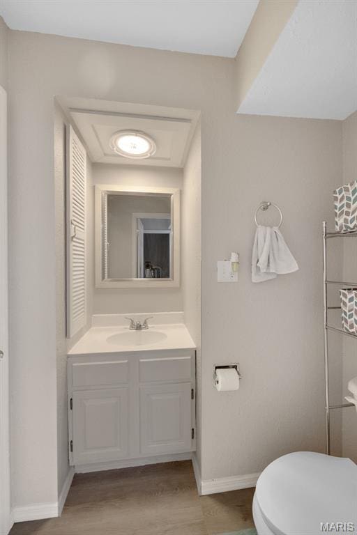 164 Burtonwood Dr, Ballwin, MO 63011 - bathroom featuring vanity and wood finished floors