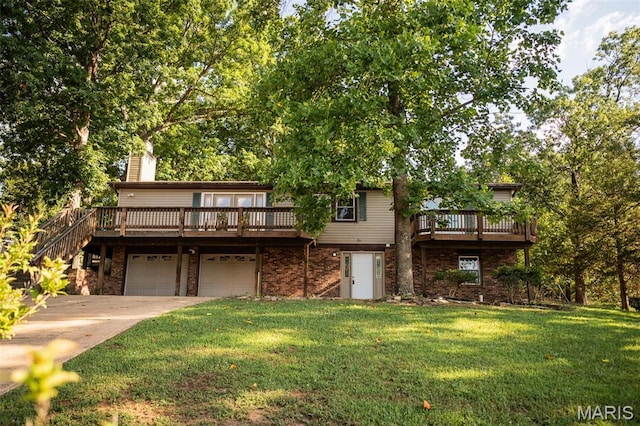 1688 Notre Dame Dr, Bonne Terre, MO 63628 - view of front of house with a front yard, concrete driveway, a wooden deck, and a garage