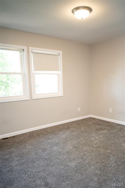 1688 Notre Dame Dr, Bonne Terre, MO 63628 - carpeted empty room featuring baseboards