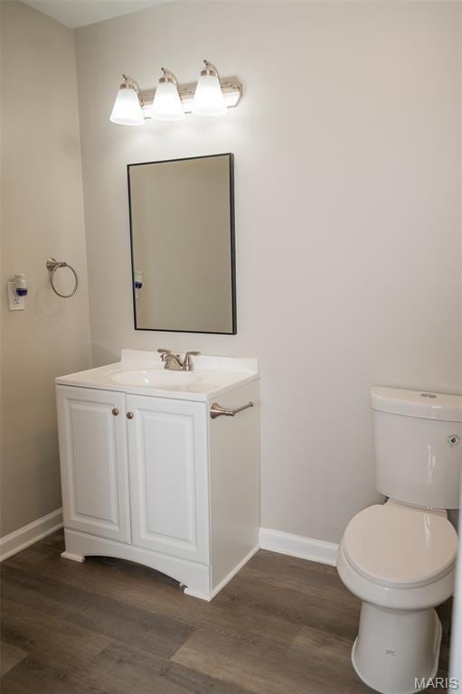 1688 Notre Dame Dr, Bonne Terre, MO 63628 - half bath featuring vanity and wood finished floors