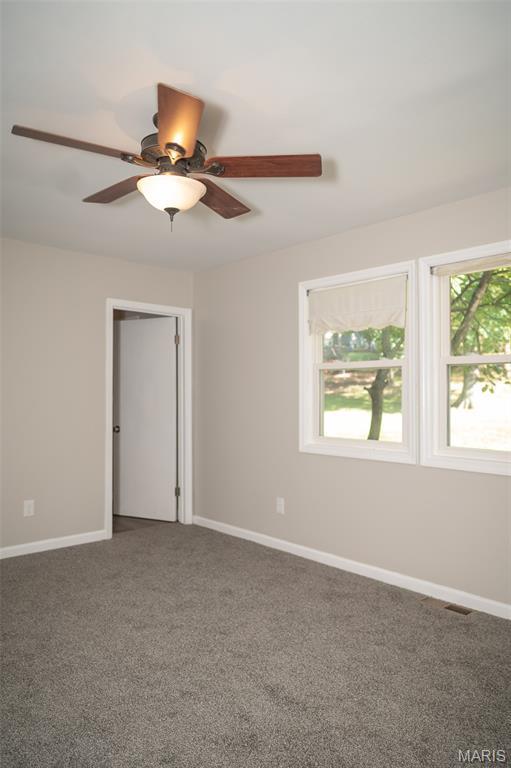 1688 Notre Dame Dr, Bonne Terre, MO 63628 - empty room with carpet flooring and a ceiling fan