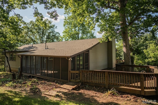 1688 Notre Dame Dr, Bonne Terre, MO 63628 - back of property featuring a sunroom, a deck, and roof with shingles