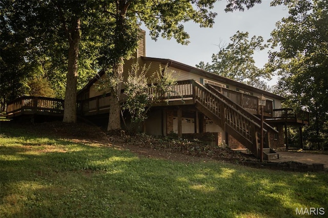 1688 Notre Dame Dr, Bonne Terre, MO 63628 - back of property with stairs, a deck, and a chimney