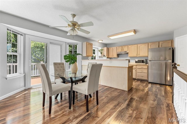 3164 Willow Bend Dr, Saint Charles, MO 63303 - dining area featuring dark wood-style flooring, a textured ceiling, and a ceiling fan