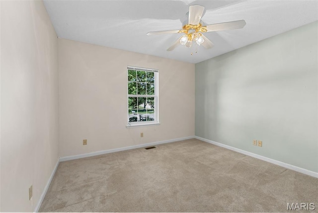 3164 Willow Bend Dr, Saint Charles, MO 63303 - spare room featuring carpet floors and a ceiling fan