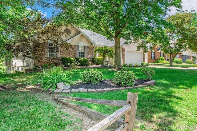 3164 Willow Bend Dr, Saint Charles, MO 63303 - view of front of home featuring brick siding, an attached garage, and a front lawn