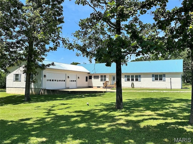 202 Maple, Licking, MO 65542 - view of front of house with a metal roof and a front yard