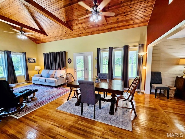 202 Maple, Licking, MO 65542 - dining area with ceiling fan, a wooden ceiling with exposed beams, plenty of natural light, light wood-type flooring, and high vaulted ceiling