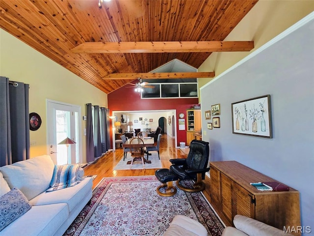 202 Maple, Licking, MO 65542 - living area featuring a wooden ceiling with exposed beams, high vaulted ceiling, wood finished floors, and ceiling fan