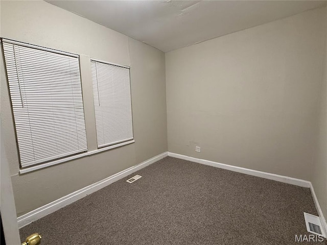 4652 Shirley Pl, Saint Louis, MO 63115 - carpeted spare room with baseboards