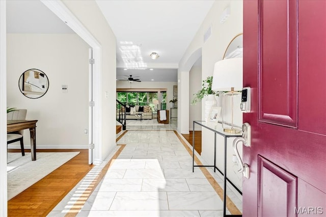 334 Lauren Lndg, Ballwin, MO 63021 - entryway featuring ceiling fan and light marble finish flooring