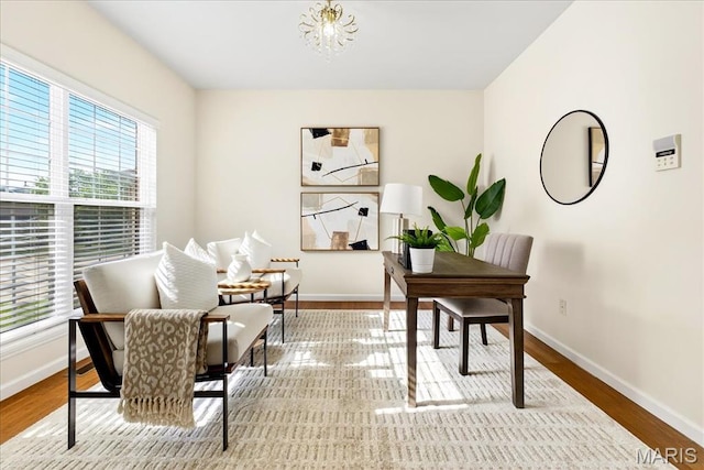 334 Lauren Lndg, Ballwin, MO 63021 - office area featuring wood finished floors and a chandelier