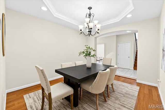 334 Lauren Lndg, Ballwin, MO 63021 - dining room with a chandelier, crown molding, stairway, recessed lighting, and light wood finished floors