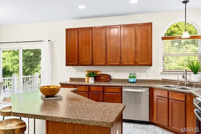 334 Lauren Lndg, Ballwin, MO 63021 - kitchen featuring stainless steel appliances, dark countertops, light marble finish floors, pendant lighting, and recessed lighting