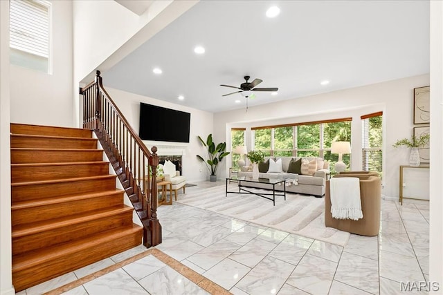 334 Lauren Lndg, Ballwin, MO 63021 - living room featuring light marble finish flooring, stairway, a ceiling fan, recessed lighting, and a fireplace