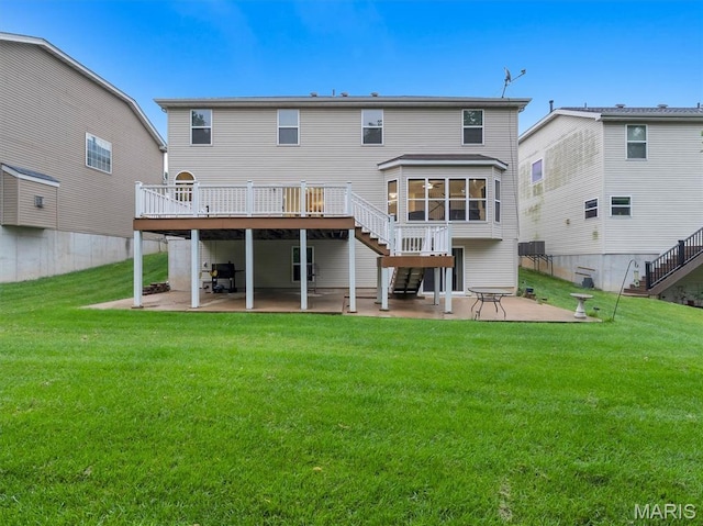 334 Lauren Lndg, Ballwin, MO 63021 - back of house with stairway, a patio, and a wooden deck