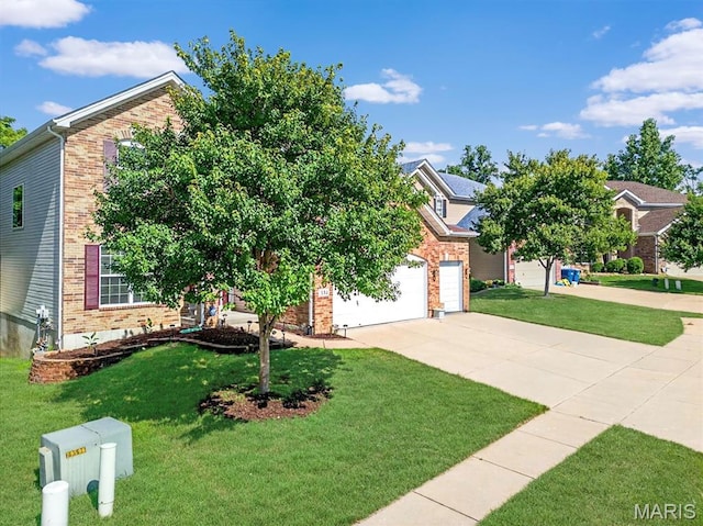 334 Lauren Lndg, Ballwin, MO 63021 - view of property hidden behind natural elements with concrete driveway, brick siding, a front lawn, and a garage