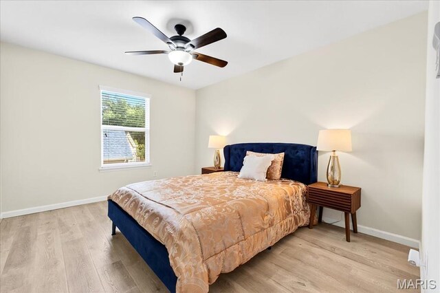 334 Lauren Lndg, Ballwin, MO 63021 - bedroom featuring light wood-type flooring and ceiling fan