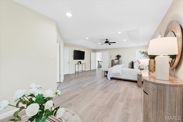 334 Lauren Lndg, Ballwin, MO 63021 - bedroom featuring a tray ceiling, light wood finished floors, and recessed lighting