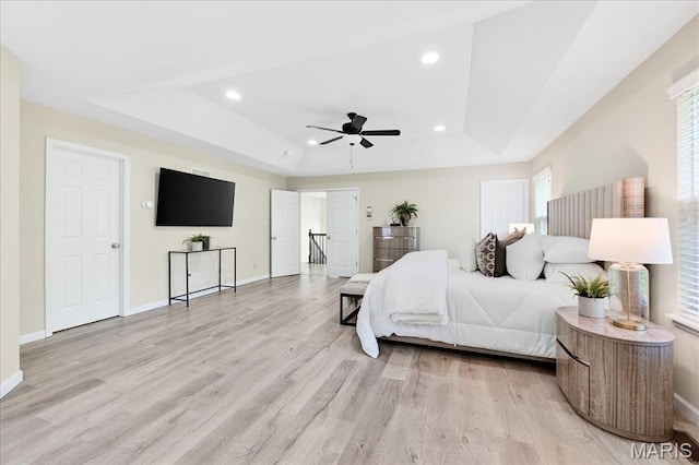 334 Lauren Lndg, Ballwin, MO 63021 - bedroom with a raised ceiling, light wood-style flooring, recessed lighting, and a ceiling fan